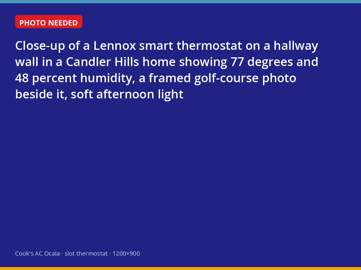 Smart thermostat displaying 77 degrees and 48 percent humidity in a Candler Hills home